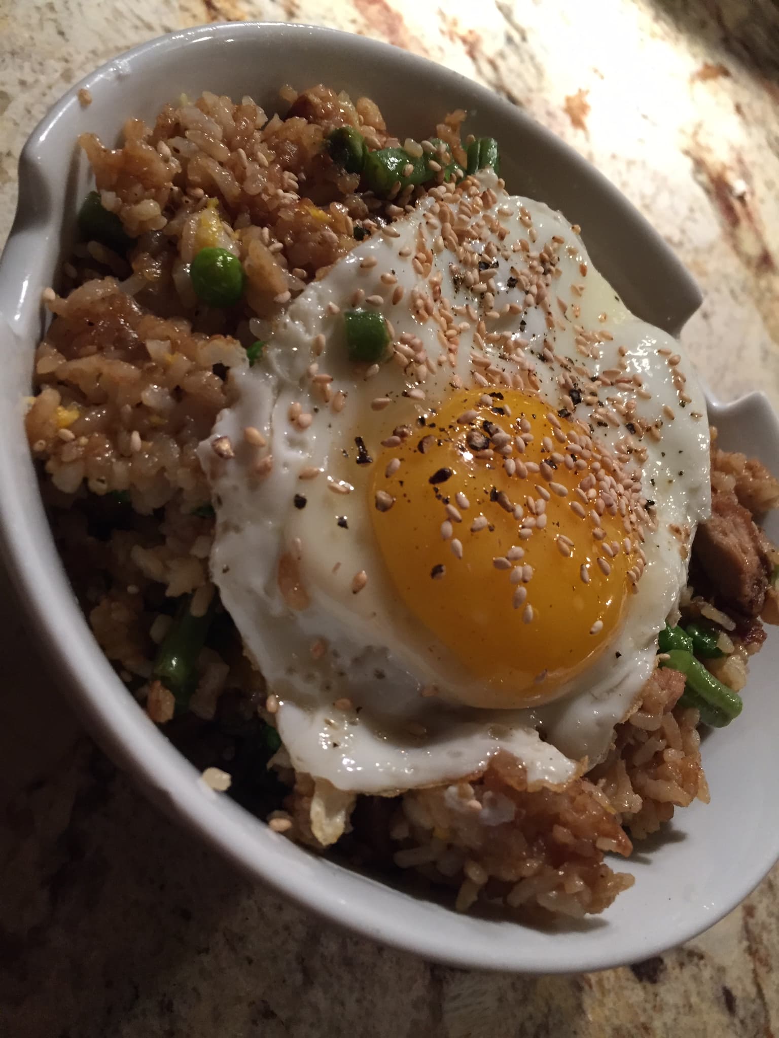 Fried rice with a sunny egg, sesame, straight from Tim's kitchen